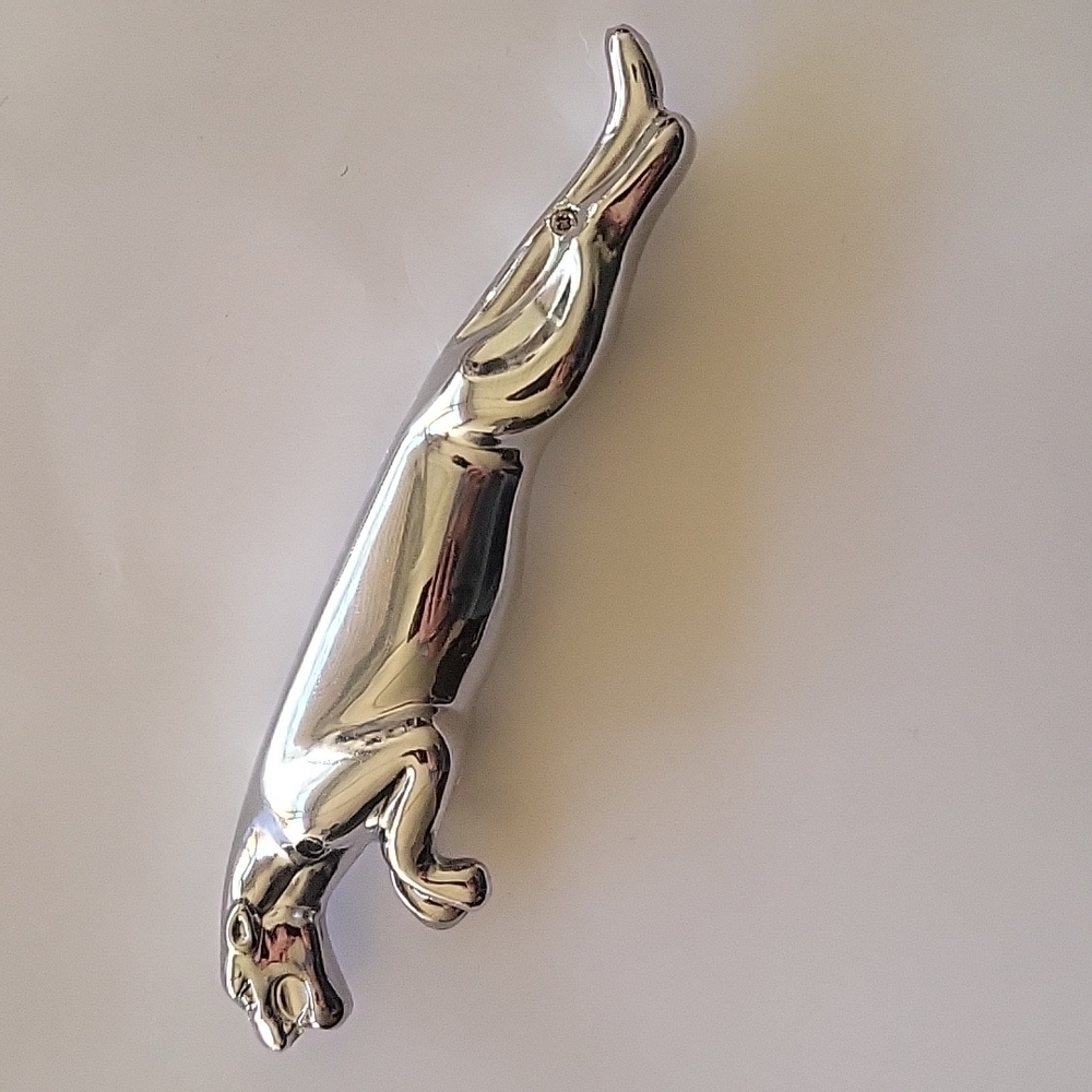 COPY - COPY - COPY - Collectible refillable jaguar looking emblem torch